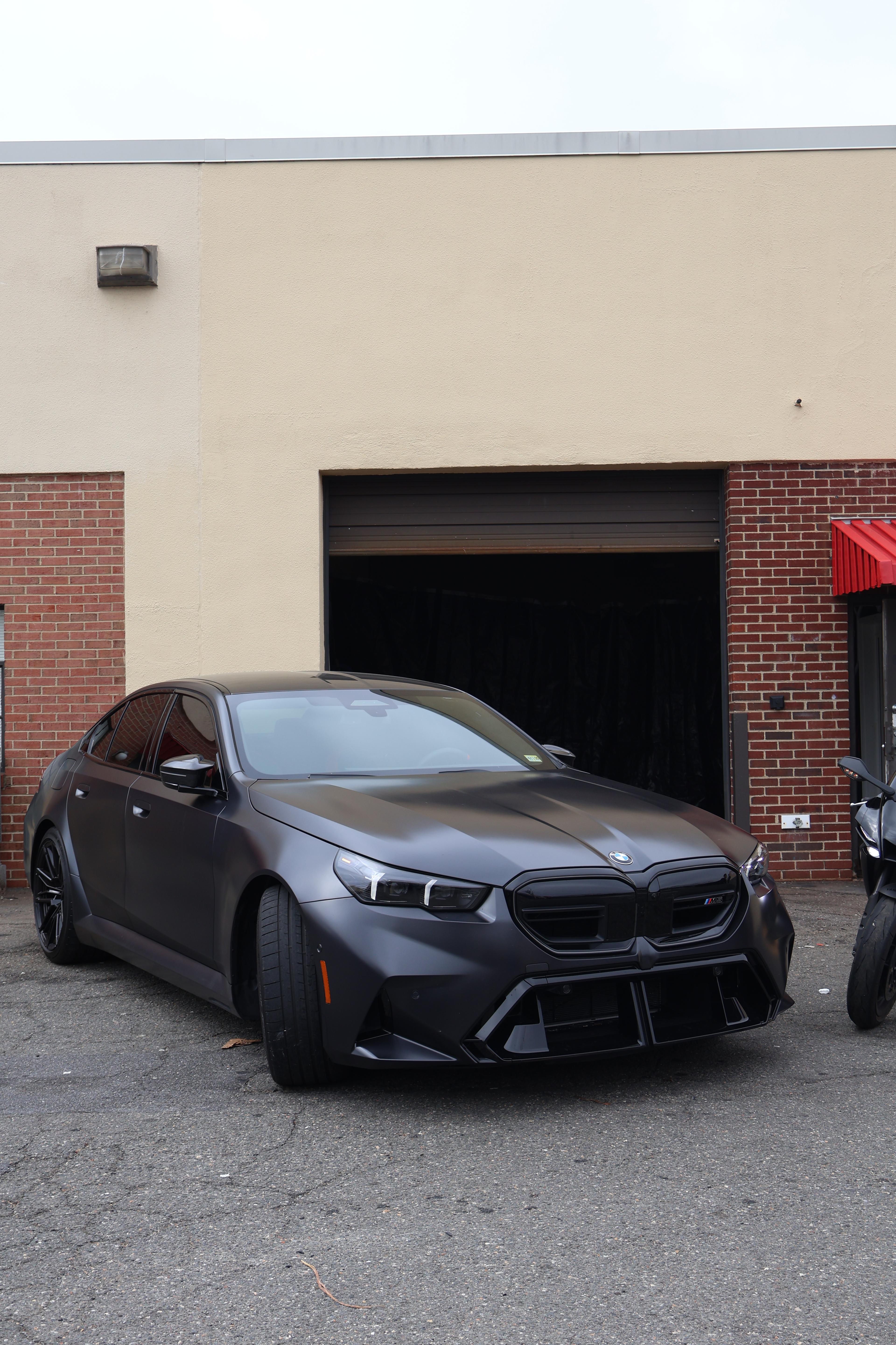 Luxury vehicle with premium window tinting showing heat reduction and UV protection